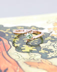 oval shape designer bridal engagement ring with green gemstone demantoid bena jewelry