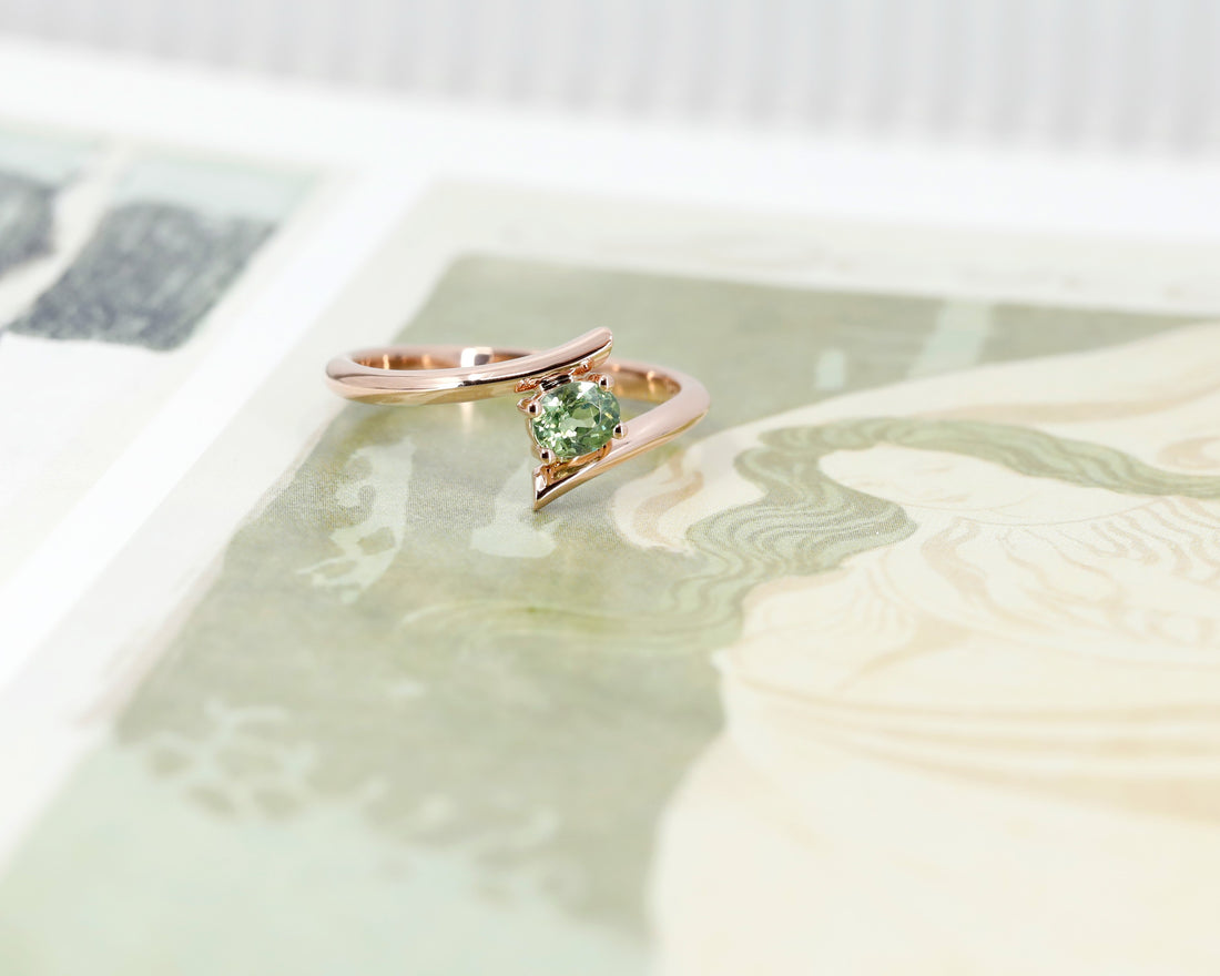 bena jewelry custom made bridal ring montreal with green gemstone demantoid garnet on multi color background