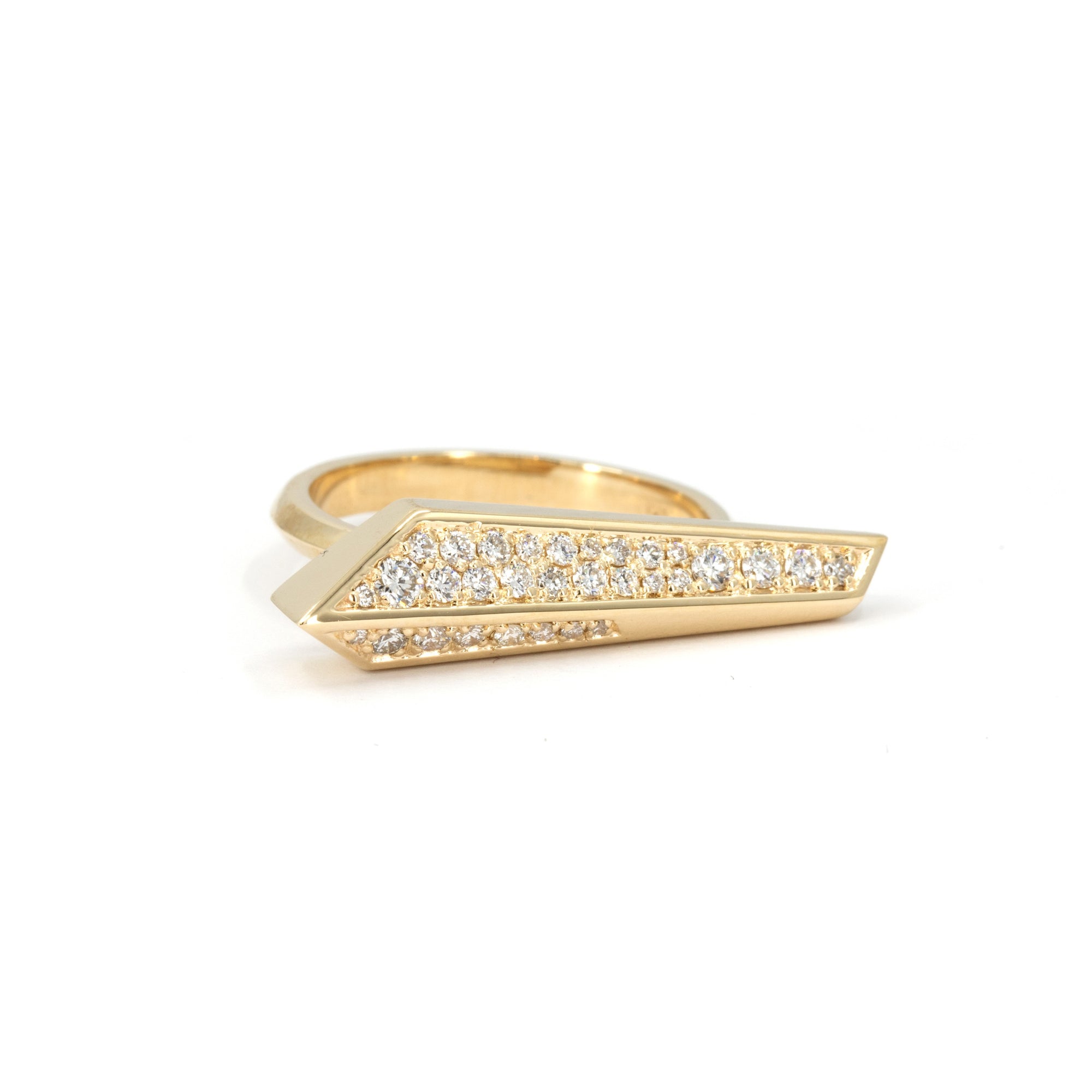 Bena Jewelry ring made in Montreal, featuring a bold arrow-shaped design in 10k yellow gold with pavé-set white diamonds, photographed on white background.
