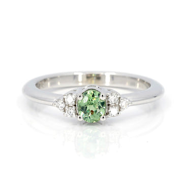 oval shape demantoid garnet diamond bridal engagement ring custom made in montreal by bena jewelry on white background