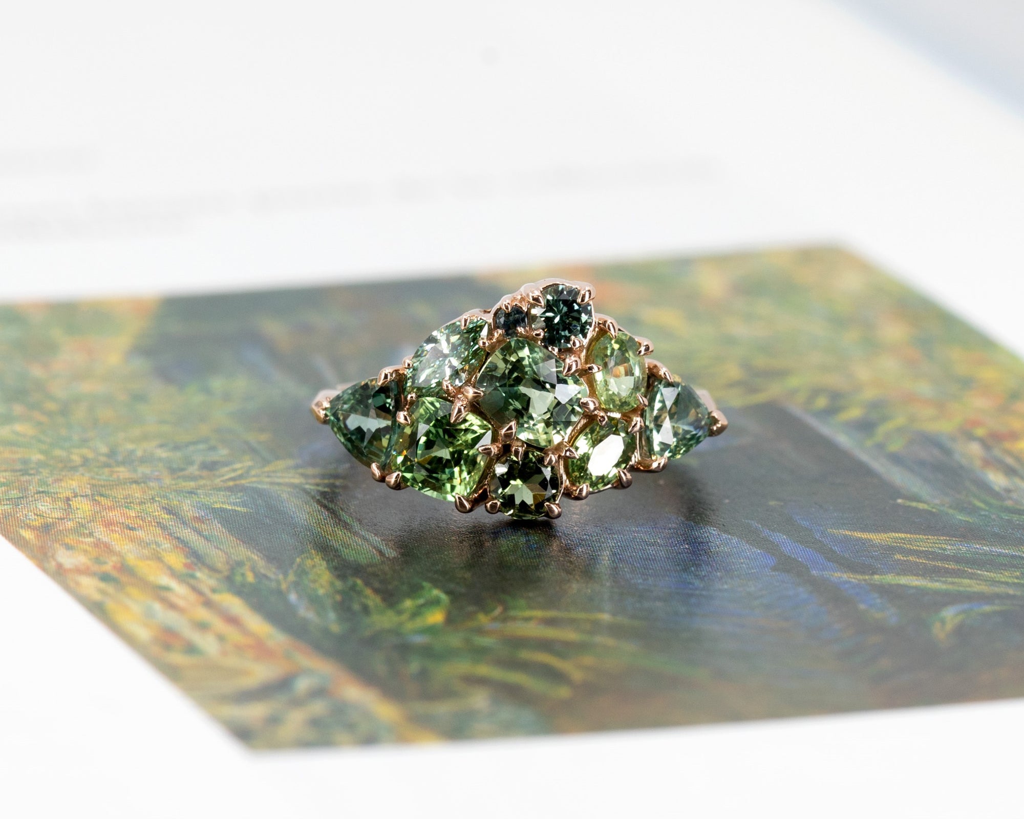 Highlights the depth and texture of the gemstones, set in a sleek rose gold band. Custom-made by Bena Jewelry, Montreal, Canada.