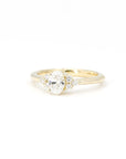 front view of bena jewelry lab grown diamond oval shape engagement ring custom made in montreal on white background