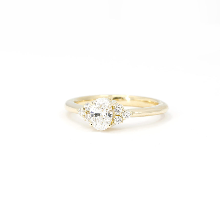 front view of bena jewelry lab grown diamond oval shape engagement ring custom made in montreal on white background