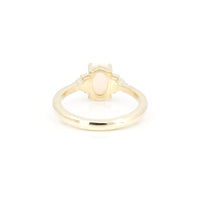 back view of yellow gold custom made engagement ring montreal bena jewelry on white background