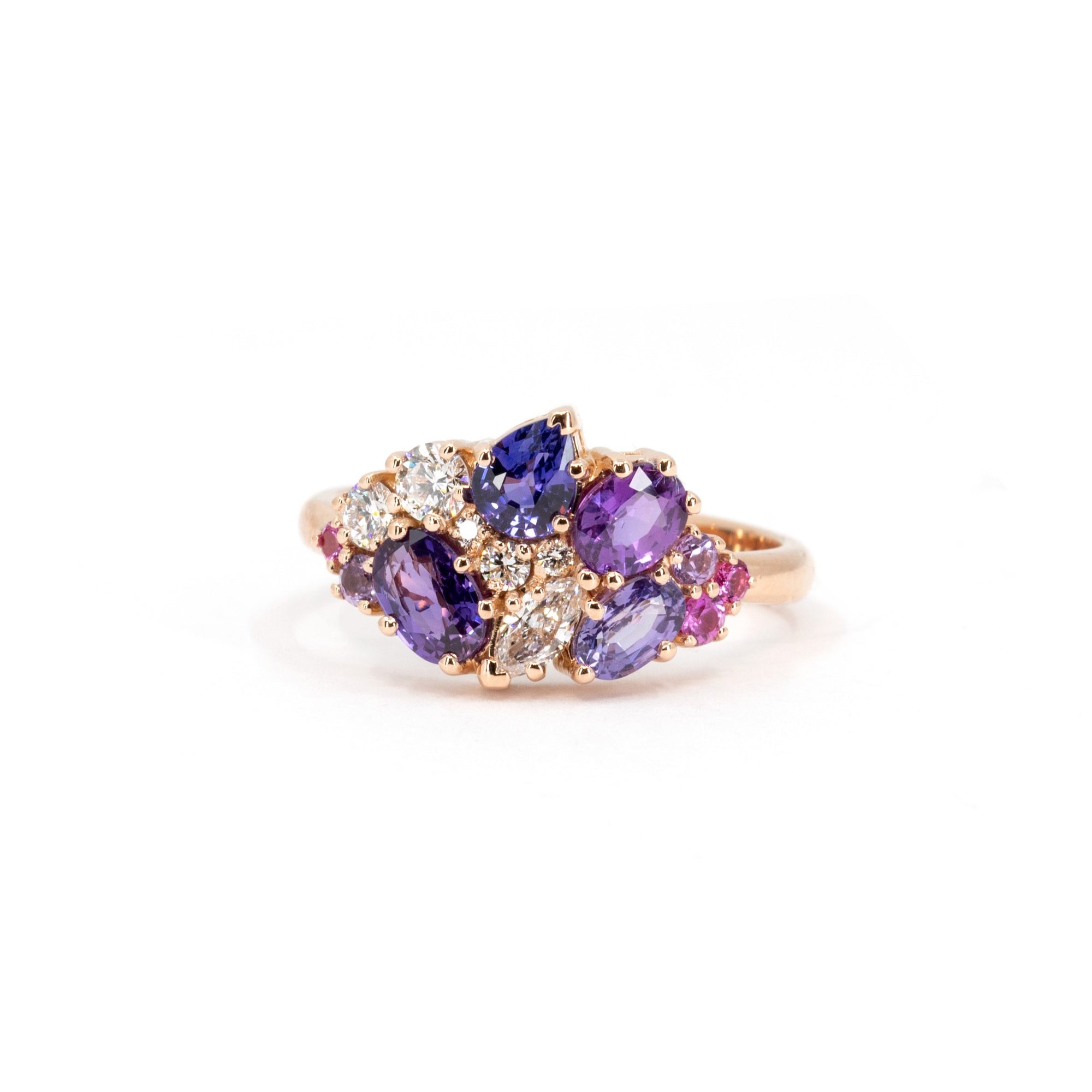 Highlights the interplay of purple and pink gemstones with the polished yellow gold band. Custom jewelry by Bena Jewelry, Montreal, Canada.