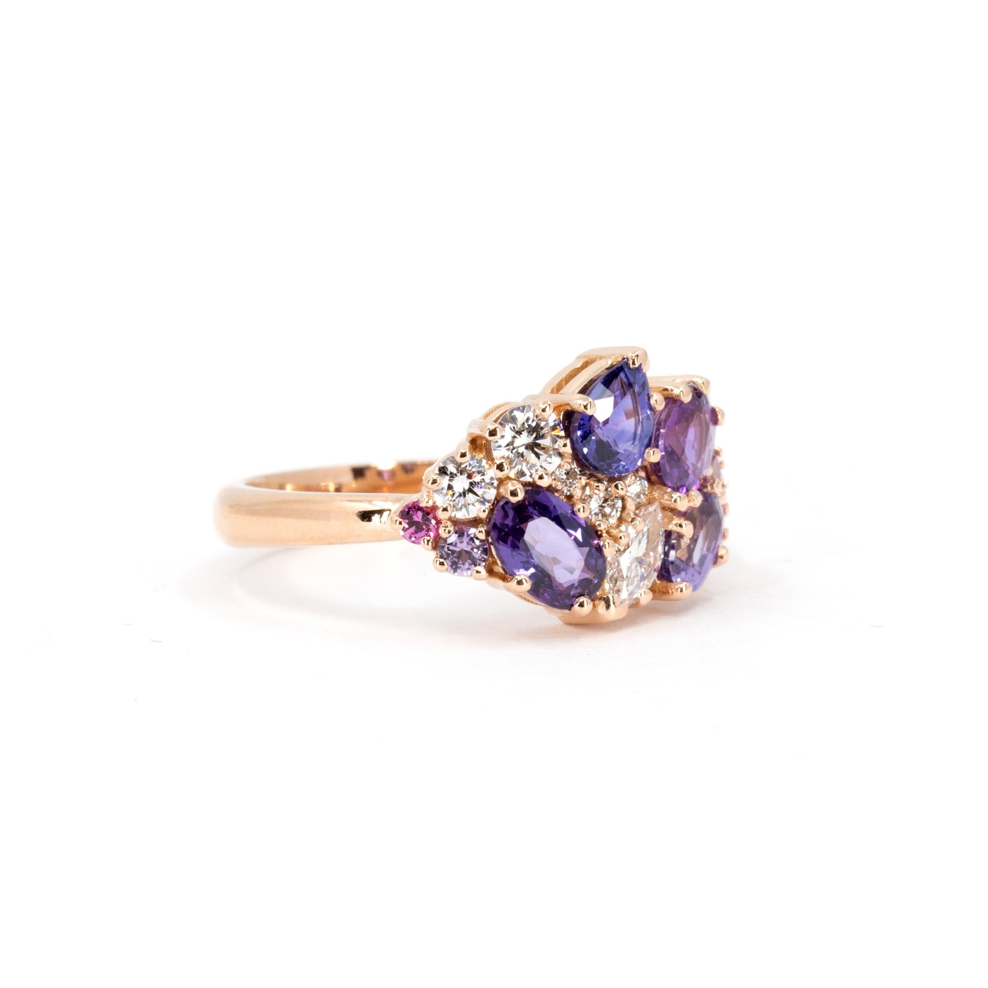 Side view: Reveals the secure gemstone settings and the fine craftsmanship of the yellow gold band. Designed by Bena Jewelry in Montreal, Canada.