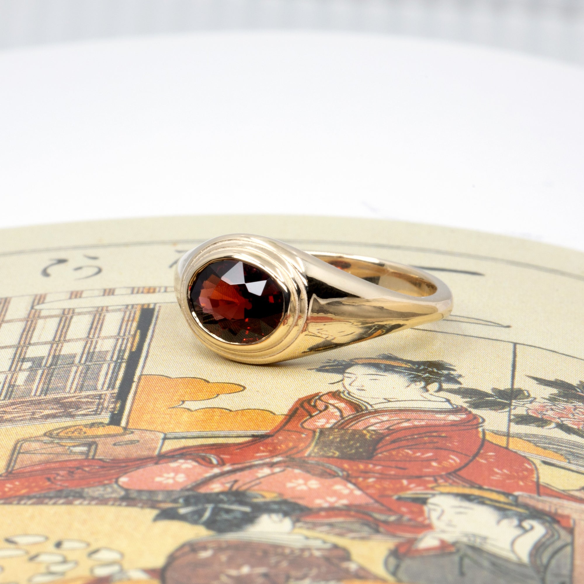 BEZEL OVAL PYROPE | Yellow Gold Ring