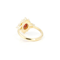 back view of yellow gold bridal engagement ring custom made in montreal on white background
