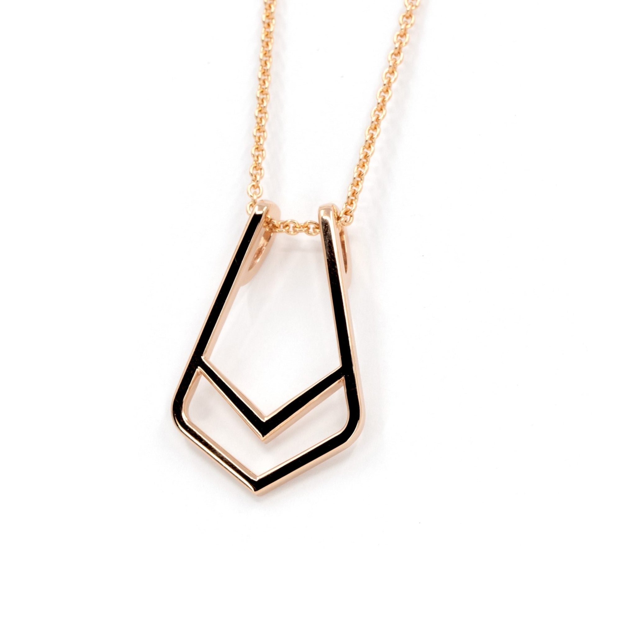 Ring Holder Pendant in Rose Gold on white background – A modern and edgy pendant designed to hold a ring, crafted by Bena Jewelry in Montreal.