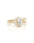 side view of round shape lab grown diamond yellow gold engagement ring custom made in montreal on white background