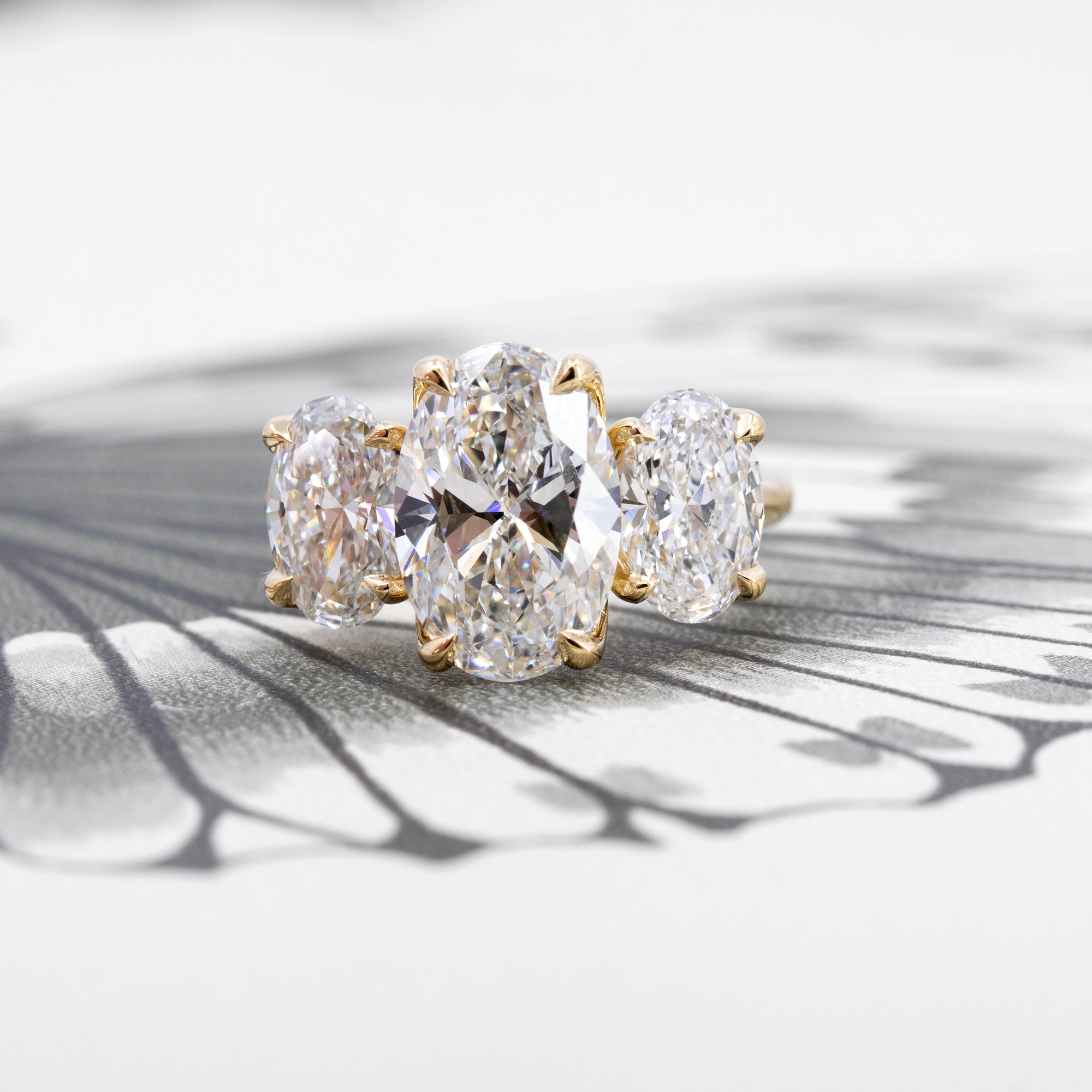 TRILOGY OVAL SHAPE DIAMOND RING | Yellow Gold