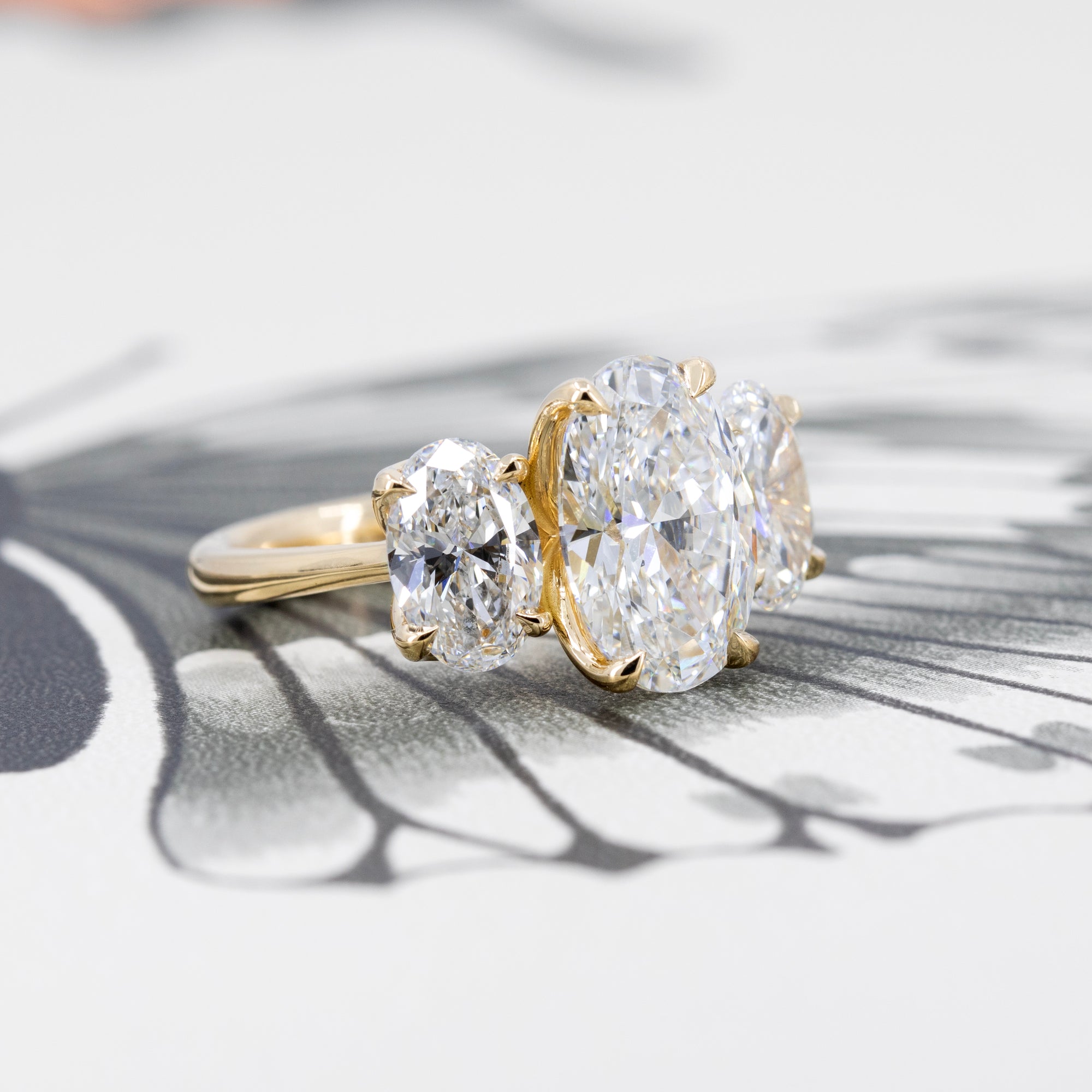 TRILOGY OVAL SHAPE DIAMOND RING | Yellow Gold