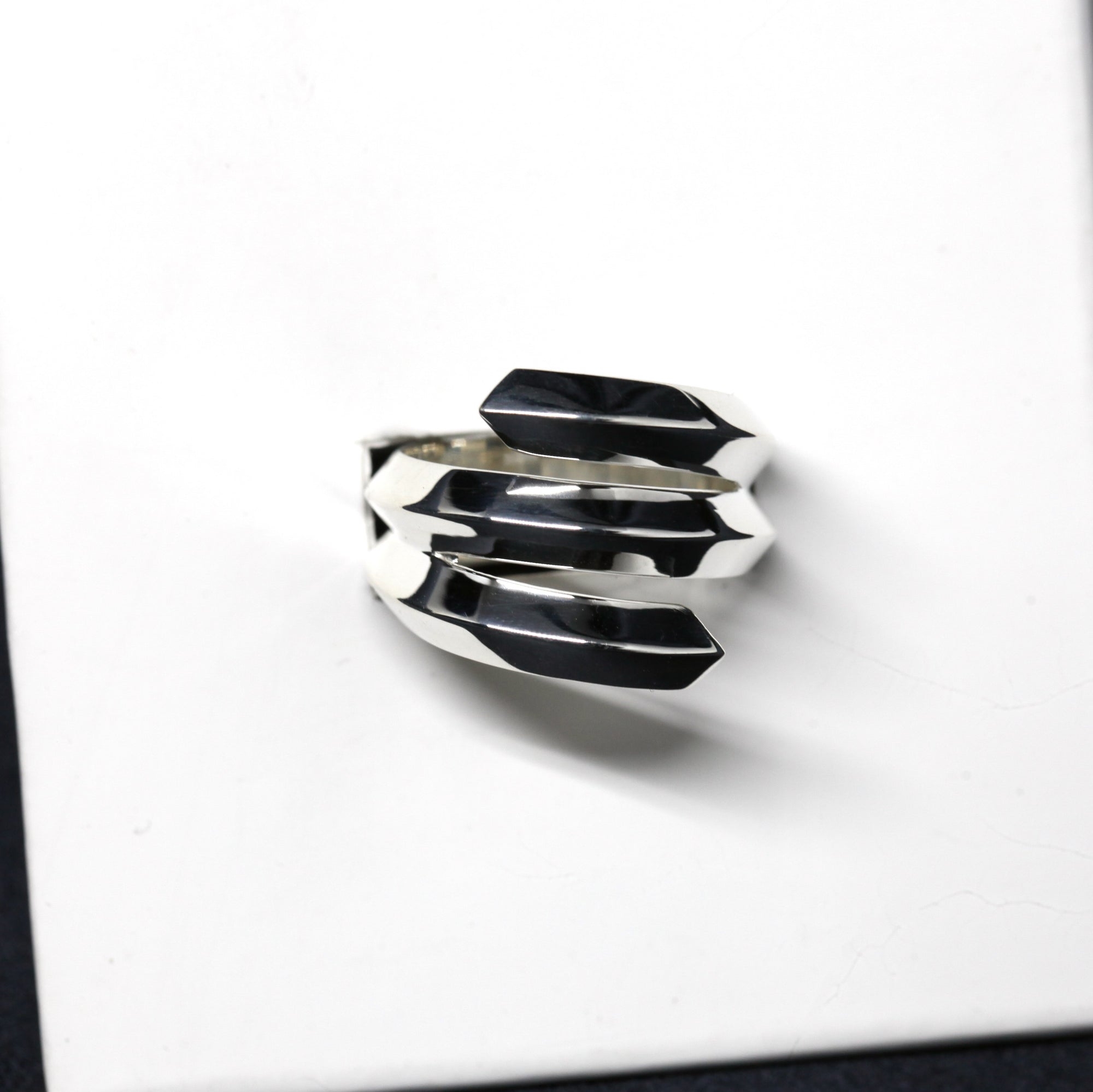 Top-down view of Embrace Ring in White Gold – A contemporary fine jewelry piece, designed with bold and avant-garde aesthetics.