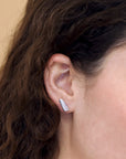 Girl wearing white gold and diamond earrings Bena Jewelry Edgy Collection Diamond Stud Earrings