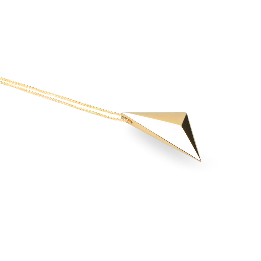 Side view of in white background edgy pendant montreal made silver gold plated sharp pyramidal pendant unisexe fashion minimalist bold big pendant montreal made in canada