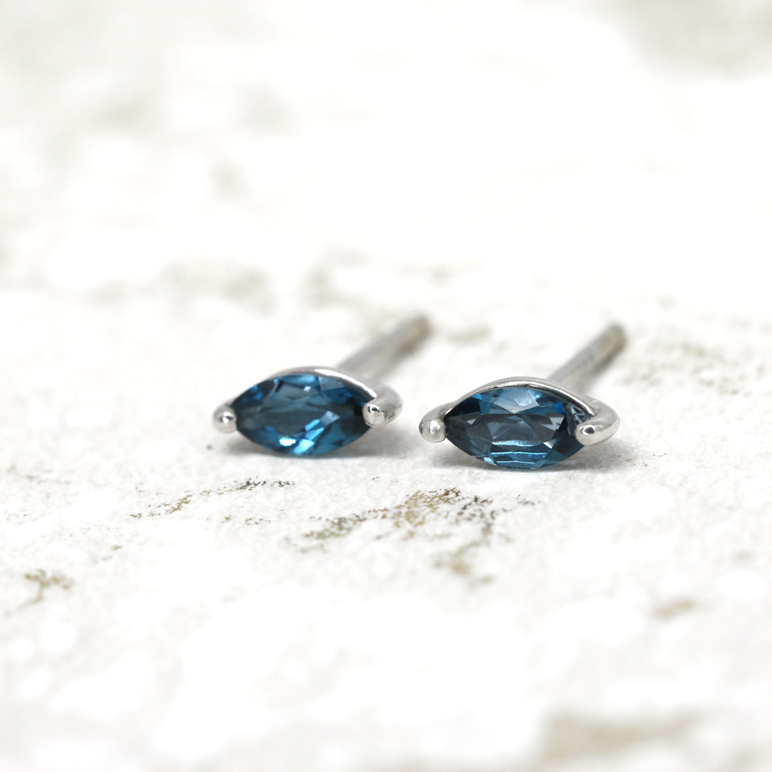 Marquise shape london blue topaz stud earrings bena jewelry edgy minimalist gemstone earrings unisexe jewelry made in montreal silver earrings blue gemstone studs silver earrings bena jewelry montreal