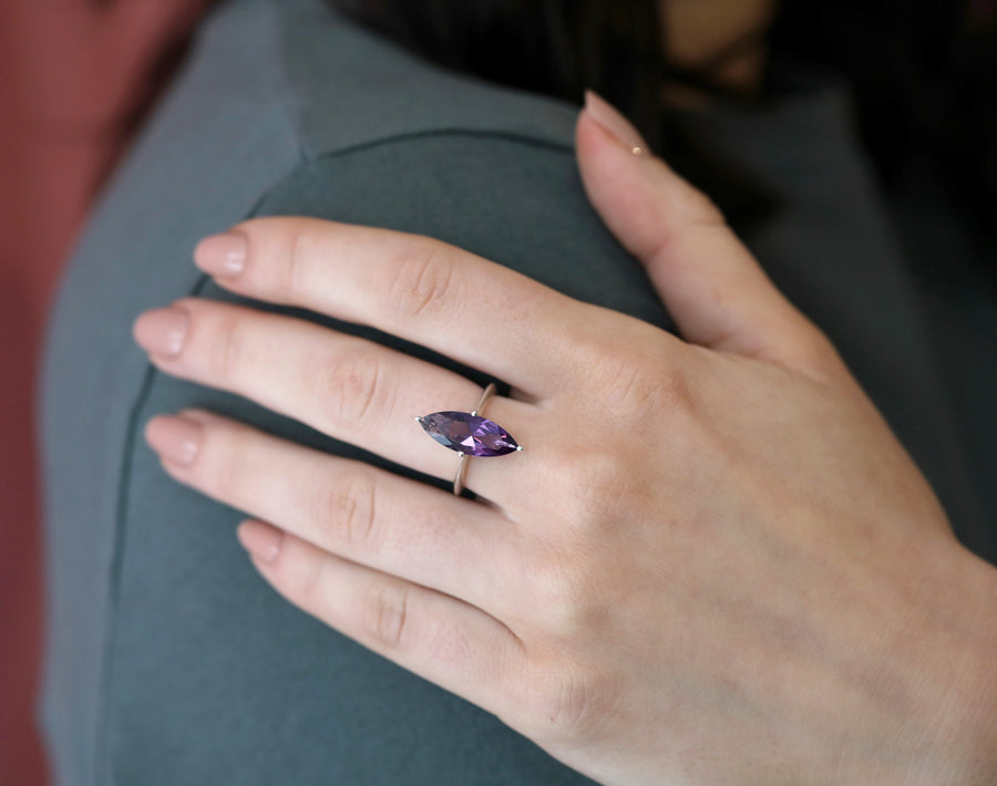 Girl wearing coktail ring amethyst marquise shape silver cocktail ring nautral gemstone custom ring designer handmade in montreal canada