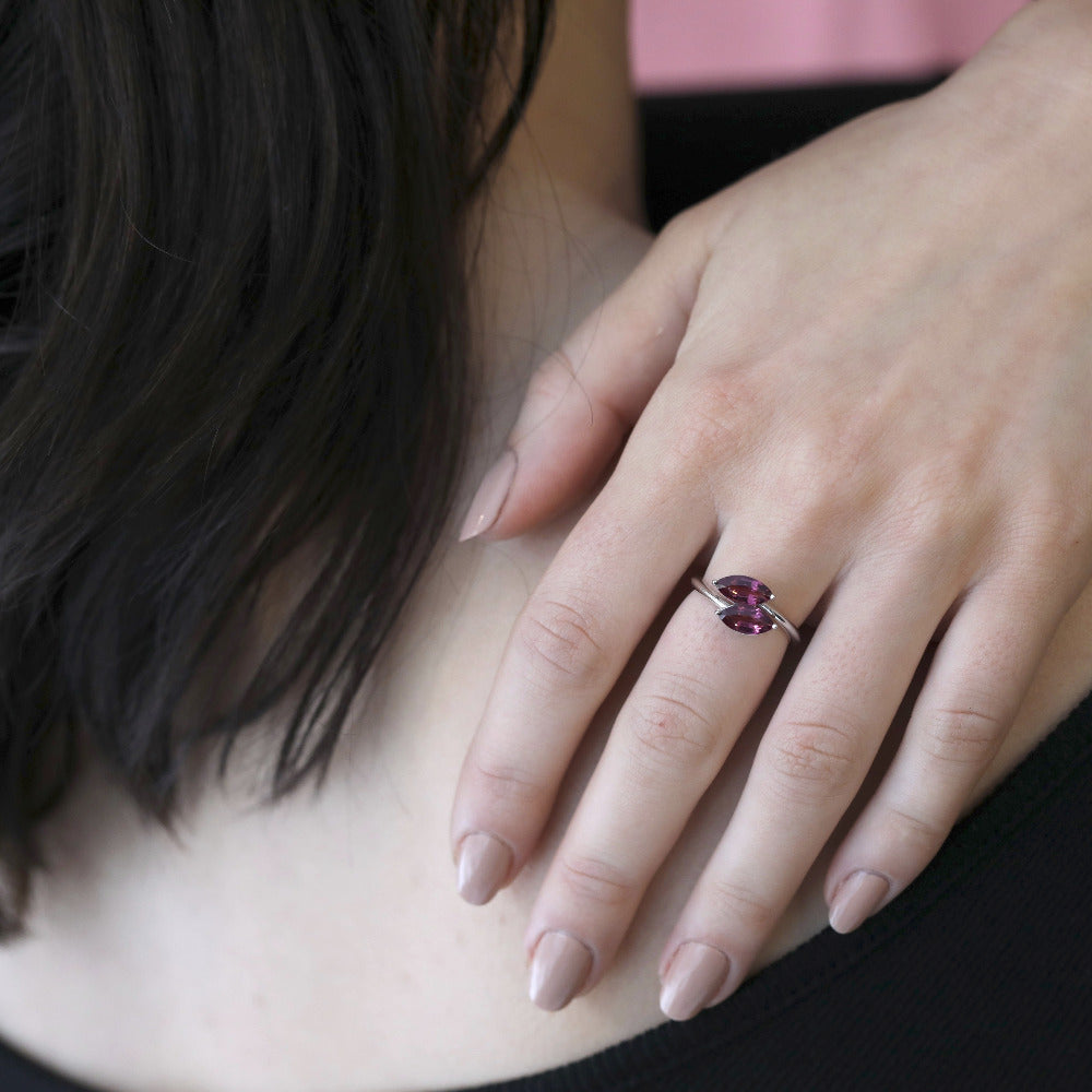 girl wearing toi et moi marquise shape rhodolite garnet gemstone bena jewelry design montreal bridal ring ruby mardi little italy