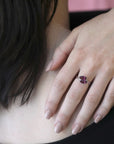 girl wearing toi et moi marquise shape rhodolite garnet gemstone bena jewelry design montreal bridal ring ruby mardi little italy