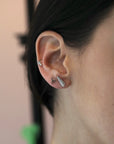 girl wearing blade earrings bena jewelry designer montreal