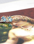 blaguette shape blue gemstone and round diamond yellow gold diamond bena jewelry designer montreal