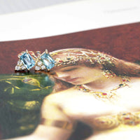 blaguette shape blue gemstone and round diamond yellow gold diamond bena jewelry designer montreal