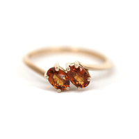 Rose gold toi et moi bridal ring with two orange spessartite garnet gemstone Bena Jewelry Montreal designer Ruby Mardi boutique Made in Canada