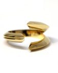 front view of unique edgy men gold ring made in montreal by bena jewelry designer on a white backouground