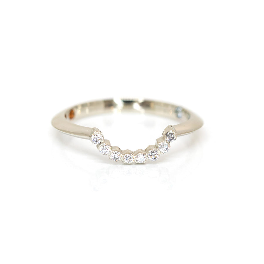 white gold diamond wedding band custom made in montreal by the designer bena jewelry bespoke engagement ring and bridal jewellery on white background