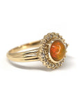 cutom made engagement ring made in montreal by bena jewelry opal gemstone and brown diamonds