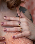 girl wearing bena jewelry opal ring and other engagement ring made in canada