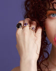 girl wearing statement ring smoky quartz amethyst rings