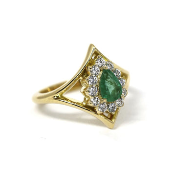 emerald gold ring and diamond halo montreal custom made fine jewelry designer bena jewelry canada fine jewelry
