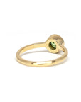 back view of round gemstone engagement ring bena jewelry montreal bezel setting ring yellow gold