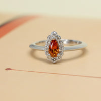 spessartite garnet diamond engagement ring pear shape natural orange color diamond halo bena jewelry color gemstone jewelry bridal designer handmade in montreal fine jewelry