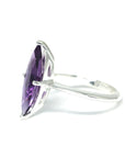 Side view of silver ring amethyst gemstone cocktail ring bena jewelry handmade in montreal little italy jewels bena jewelry edgy luxury amethyst gems ring