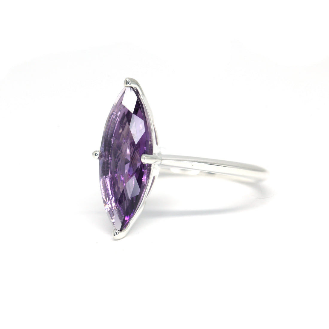 Side view of edgy cocktail ring marquise shape bold cockail ring bena jewelry edgy collection natural purple gemstone custom ring specialist montreal little italy jeweler