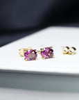 purple gemstone stud earrings bena jewelry custom made garnet jewelry bridal minimalist gemstone stud earrings made in montreal little italy fine jewelry local studio oval shape garnet gemstone earrings