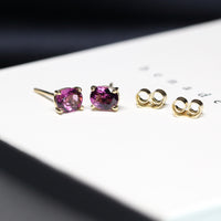 front view of rhodolite garnet gemstone stud earrings bena jewelry montreal purple natural gemstone earrings made in montreal pink gemstone earrings studs little italy jeweler