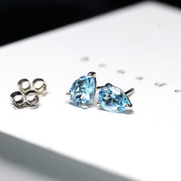 Pear shape blue topaz natural color gemstone minimalist stud earrings light blue natural color gemstone localy made in montreal canada 