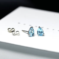 Bena Jewelry sky blue topaz pear shape small minimalist edgy stud earrings montreal made in canada simple everyday color gemstone custom jewelry designer handemade in montreal canada