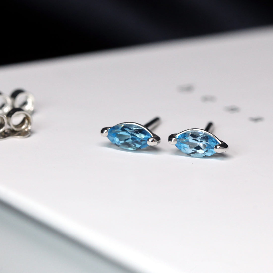 Gemstone stud earrings sterling silver marquise blue topaz
