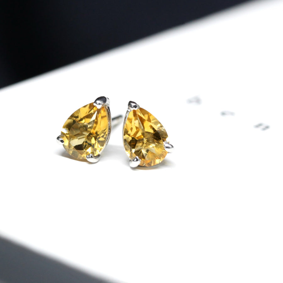 Front view of yellow gemstone stud earrings bena jewelry minimalist color gemstone jewelry citrine earrings pear shape natural gemstone quartz montreal made in canada fine jewelery designer color gemstone bridal jewelry