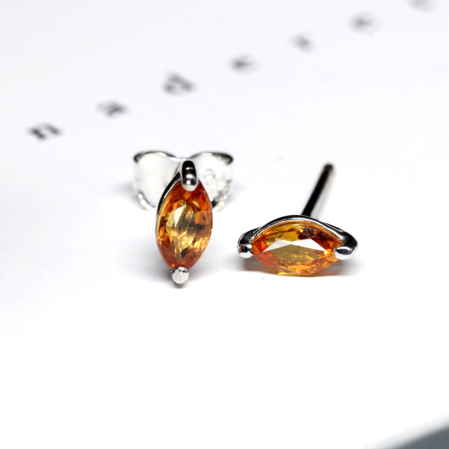 gemstone stud earrings marquise shape orange sapphire natural color gemstone custom made in montreal fine edgy jewelry designer montreal made in canada fine jewelry small marquse shape gemstone