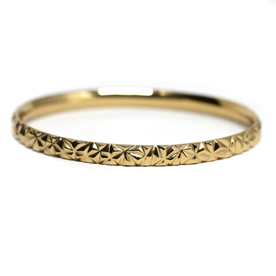 gold bangle edgy jewelry bena jewelry montreal