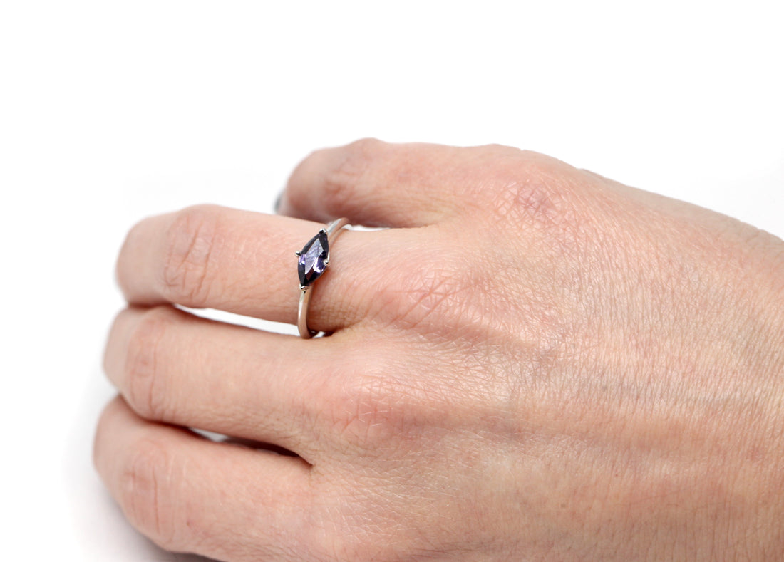 Girl wearing a marquise shape spinel ring edgy bena jewelry montreal made in canad bridal jewelry minimalist style montreal made white gold ring bridal custom made jeweler little italy