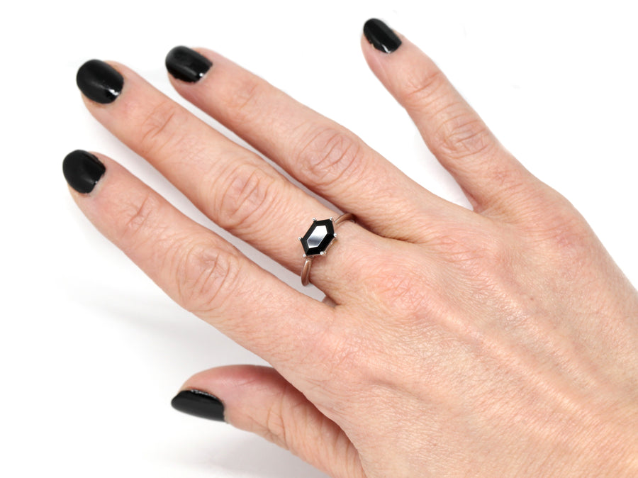 Girl wearing hexagonal black natural gemstone spinel dark gems bridal ring custom jewelry montreal color gemstone bena jewelry white gold simple bold ring edgy shapes montreal made in canada bridal jewelry