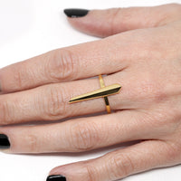 Girl wearing edgy collection custom made ring montreal bena jewelry silver gold plated jewelry vermeil gold unisexe fine jewelry man and woman minimalist jewelry design