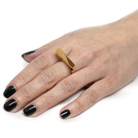 Girl wearing bena jewelry vermeilg gold edgy jewelry bold minimalist ring yellow gold plated silver unisex minimalist jewelry studio little italy montreal handmade in canada custom fine jewelry