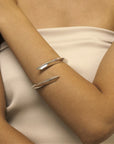 Woman wearing statement bracelet silver jewelry bracelet